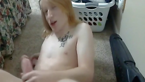 Black haired chick does it in the bathroom